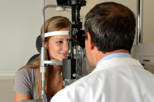 Eye Doctor with female patient during an examination